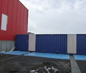 The first containers that form the building blocks of the new east wing have been put in place