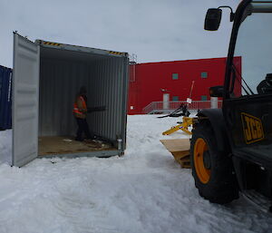 Winter plumber Rob clearing the last of the equipment out of the ebox to start installing the new boilers in the MPH