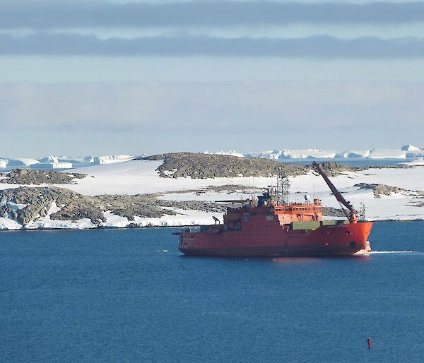 The Aurora Australis on anchor in the bay in front of the station