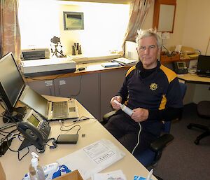 Dr. Gerry Bulger getting to know his new toys (lung function testing equipment)