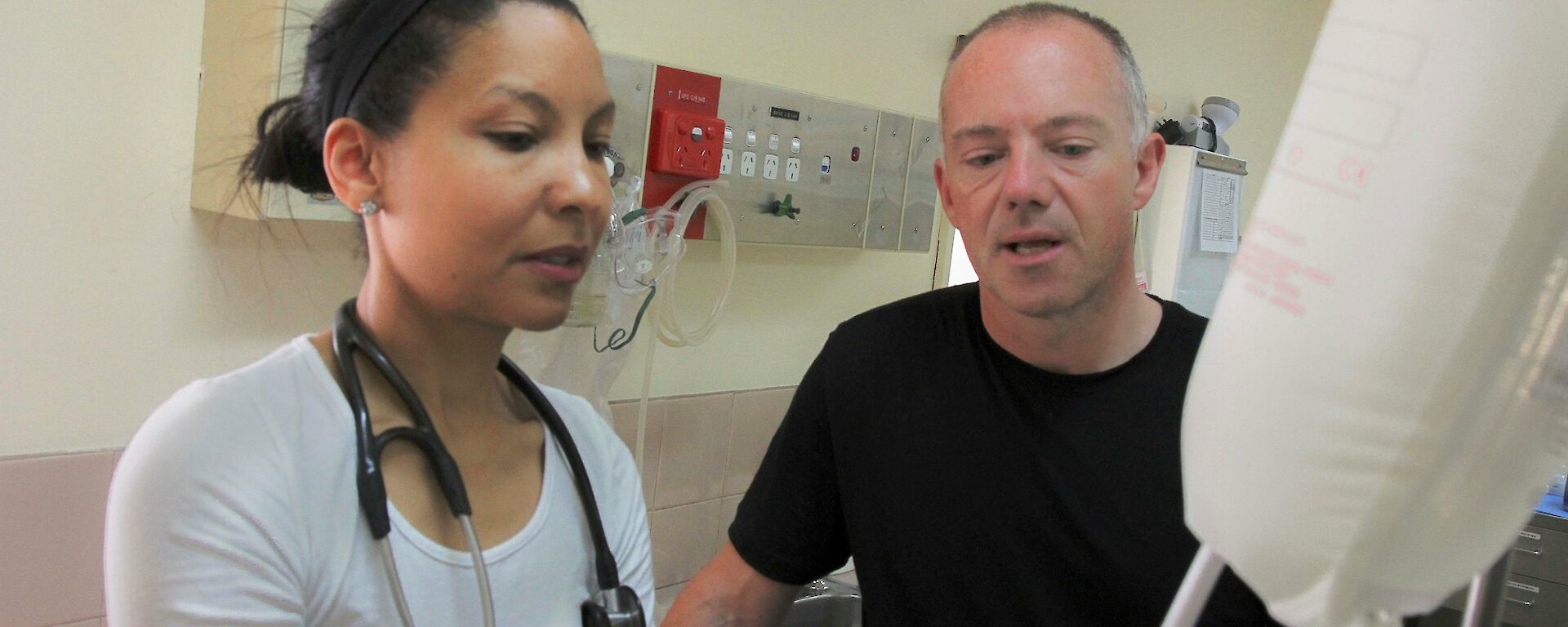 Dr Sheri Newman and Dr Nick Lerch discussing procedures in the surgery