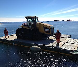 Tracker on floating vessel is nudged ashore by small boat