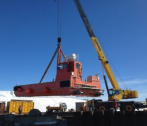 Lifting the barge out of the water at the end of the work day