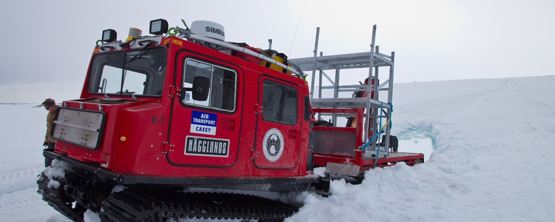 A Hägglund being recovered after being bogged in melted ice