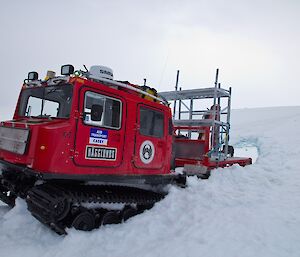 A Hägglund being recovered after being bogged in melted ice