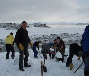 French volunteers happily enjoying the snow