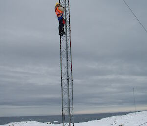 Jukka climbing radio mast