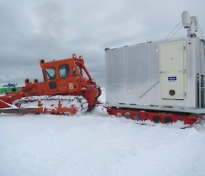 Gavin recovered iced in huts from Wilkes and pull them back with a D7 dozer