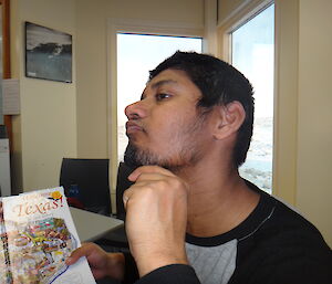 Portrait of Abrar in the station library