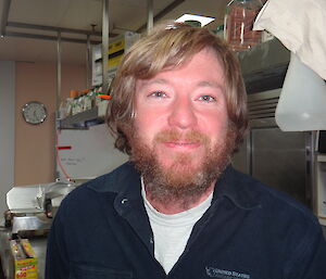 Portrait of Tim in the kitchen