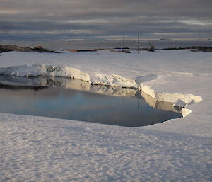 Noonan Cove with reflections of the sky off the water