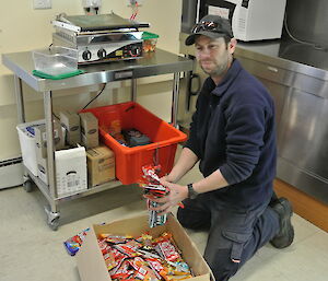 Aaron filling up the chocolate box