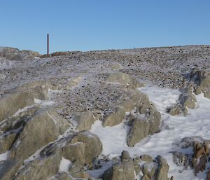 Shirley Island rocky terrain with random loose pebbles left over my the Adelie penguins