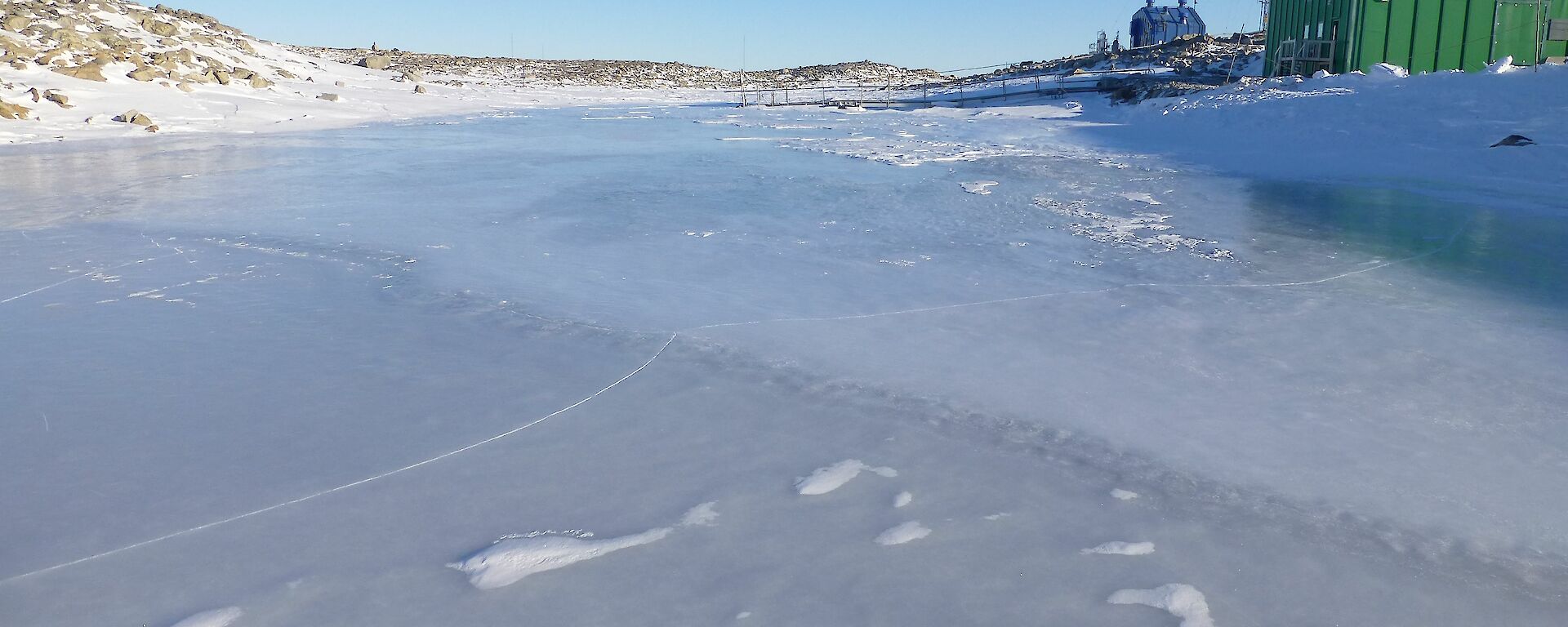 Picture of an icy melt lake