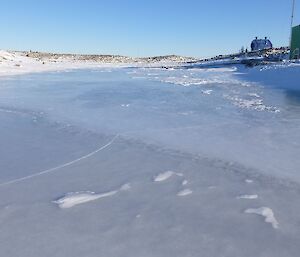 Picture of an icy melt lake