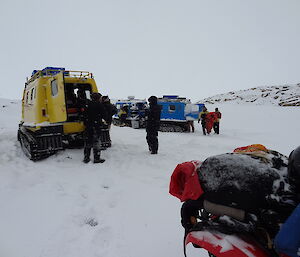 Two Hägglunds with SAR team unpacking gear