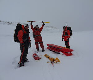 Three SAR member posing around the floating pod