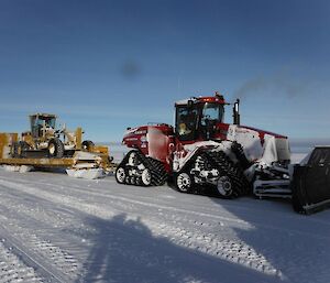 Heavy machinery with snow in every crack and small space