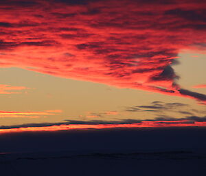 Colourful clouds from sunrise rays