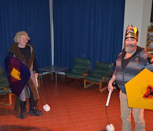 Gavin and Mark holding their family shields