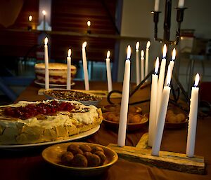 Candlelit table with beautiful dessert dishes