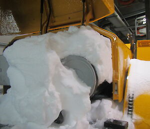 snow inside an Overaasen snow blower