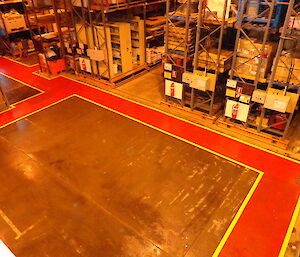 A top view of the red walkway in the greenstore warehouse