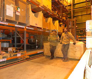 Mark and Aaron posing with the completed warehouse racks