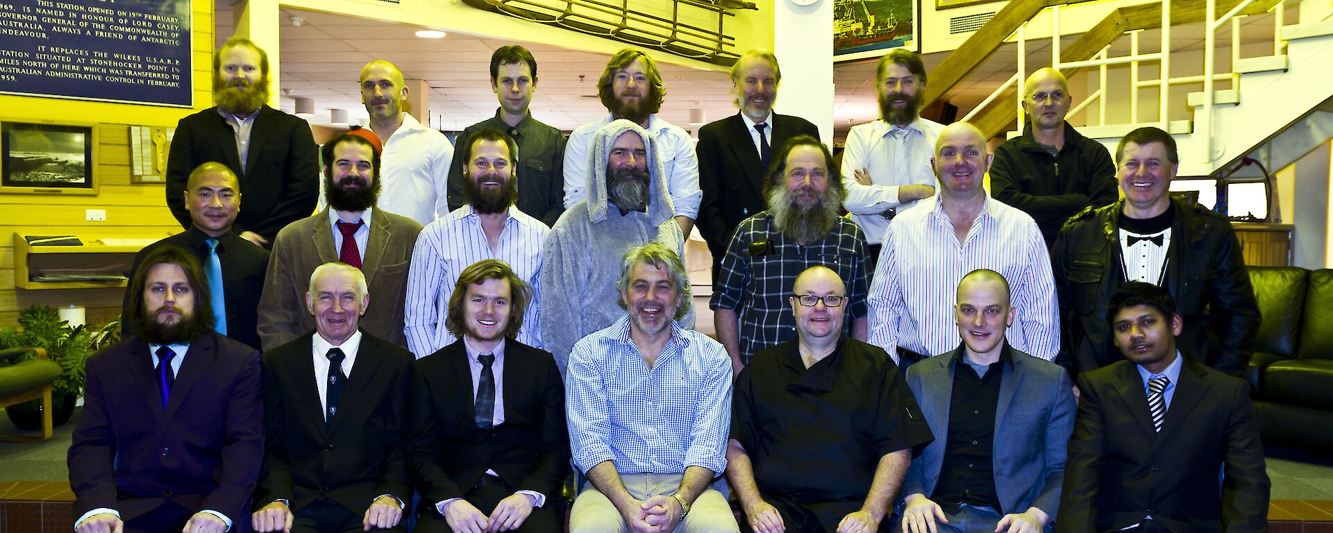 A group shot of everyone at Casey. All smartly dress except for Gavin in a Wilfred suit