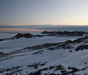 Browning snowy and rocky landscape