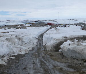 Snow cover terrain with a groomed road