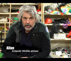 Allan sitting in front of the camera as an Antarctic wildlife adviser