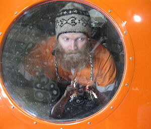 Matt Inside the orange melon looking through the window