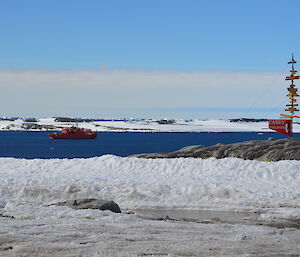 The Aurora Australis in Newcombe Bay with the Casey sign in the foreground