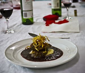 Ox tongue, skordalia, sour cherry sauce and straw potatoes