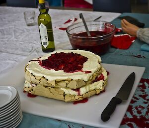 Pavlova sandwiched with “bloody berries”