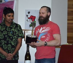 Mike receiving winners award from Abrar
