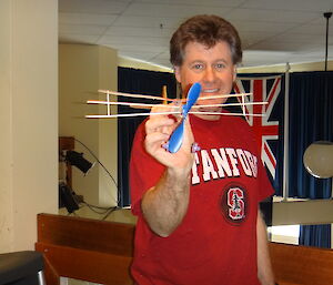 Mark showing off his toy triplane