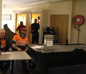 Doug and Gavin sitting on a desk for the election