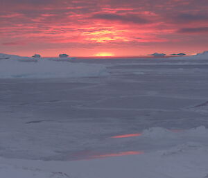 Cloudy red sunset from wharf