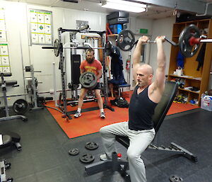 Mick and Lee working lifting weights