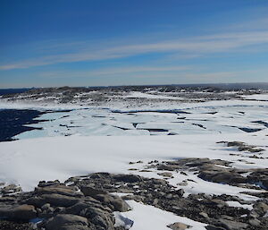 Picture of pancake sea ice breaking up across the bay