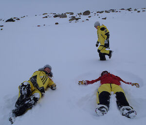 With all the fresh snow around, the girls can’t resist making snow angels