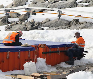 Danielle and Johan removing covers