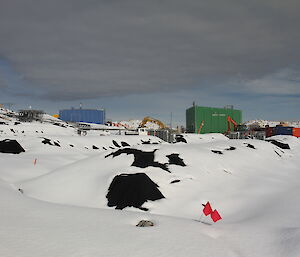 Snow covered biopiles