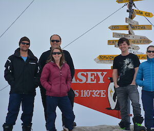 The Casey Met Team (L to R): Steve, Krzysztof, Jane, Dan and Lena standing next t the Casey sign on the ice.