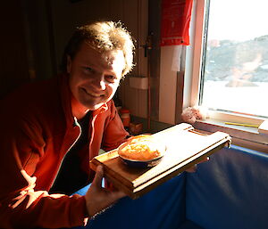 Pete’s smiling at the canned pie he is about to eat