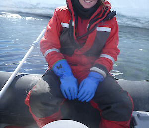 Expeditioner with a bucket of creatures