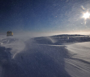 Blowing snow catching the light