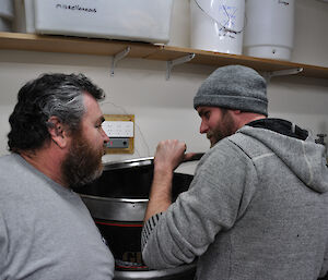 Expeditioners in the Casey home brew room